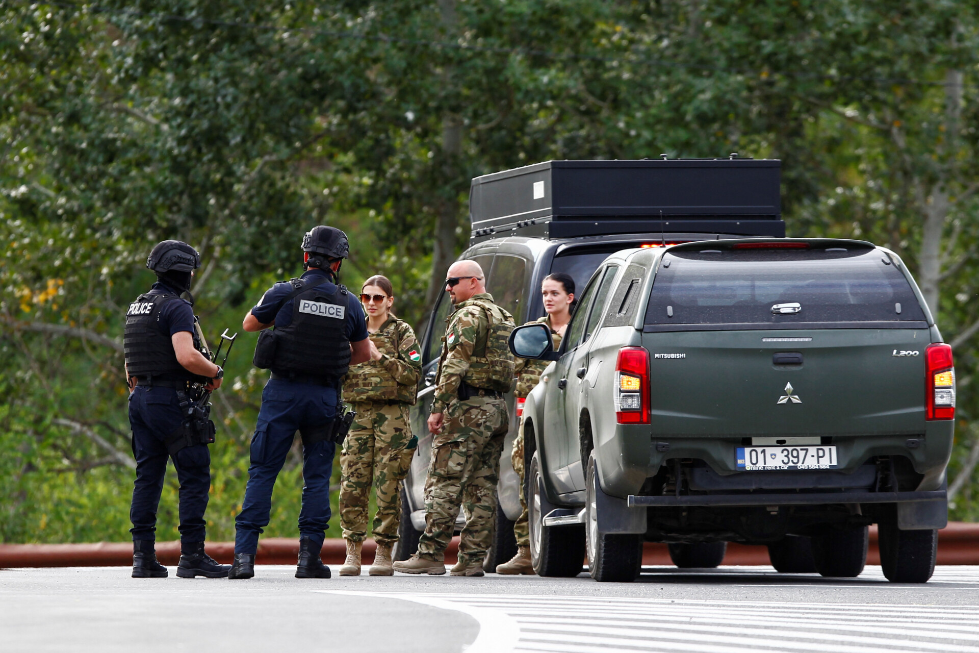 The police surrounded the monastery, where 30 armed men were holed up